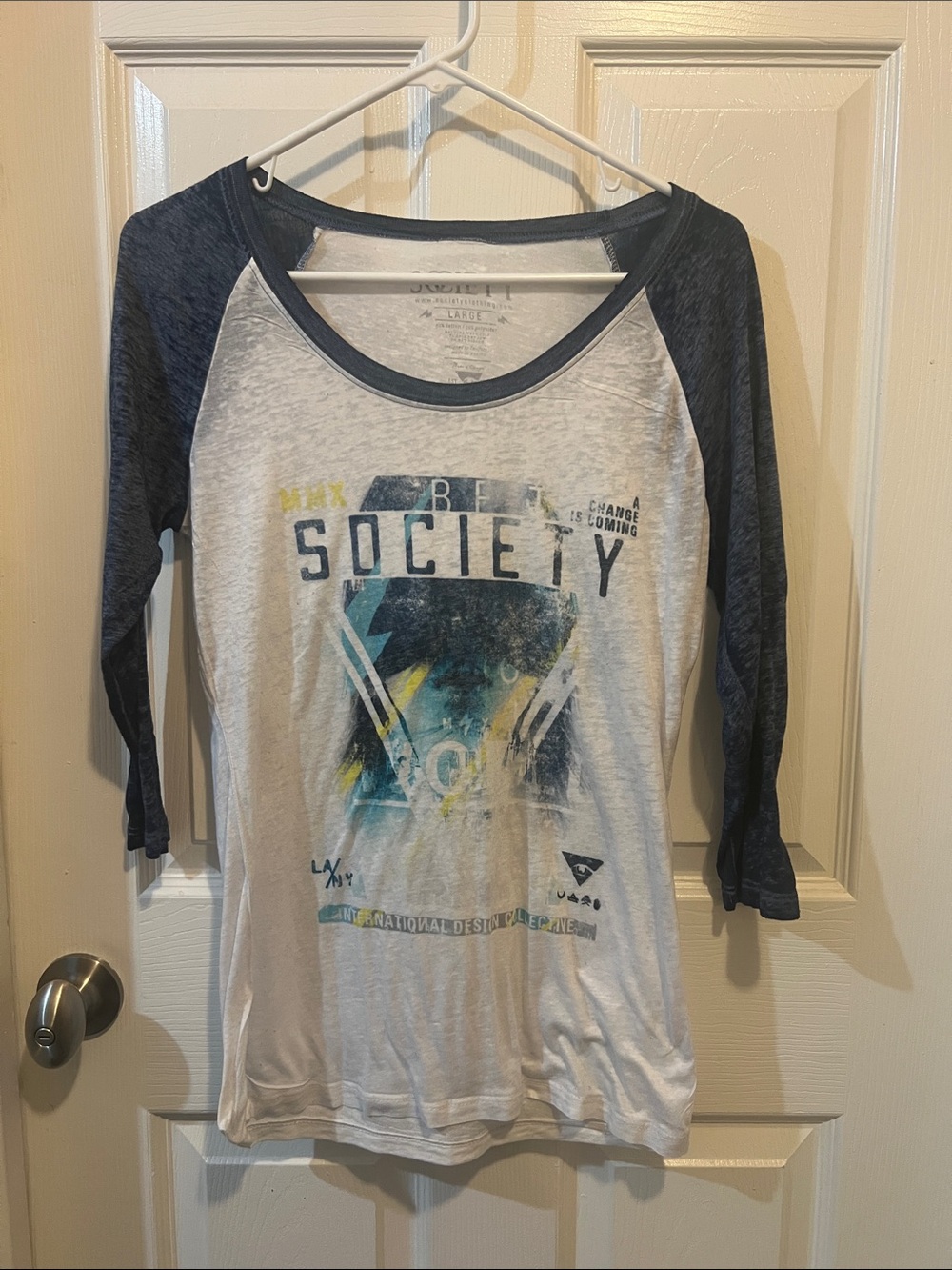 Society White Tee with Navy Raglan Sleeves and Graphic Print